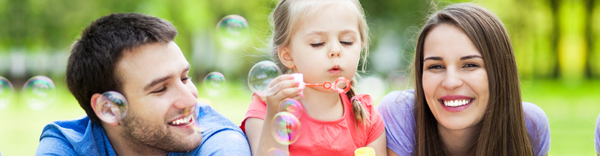 image of the family playing bubbles